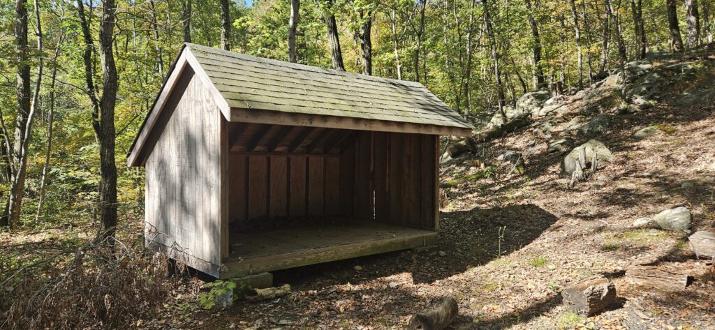 An image of a shelter on a hiking trail