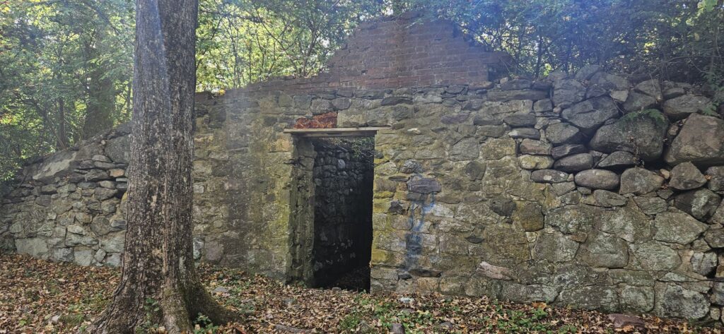 An image of the stone ruins of an ice house