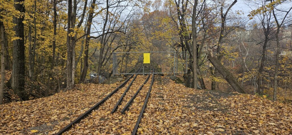 An image of a fenced off train trestle