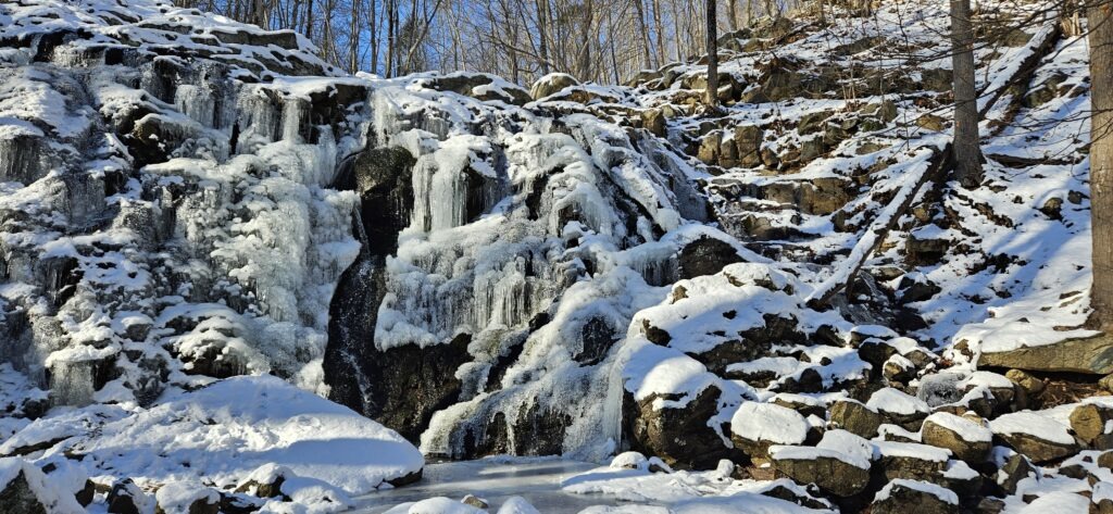 An image of MacMillan Falls in the winter