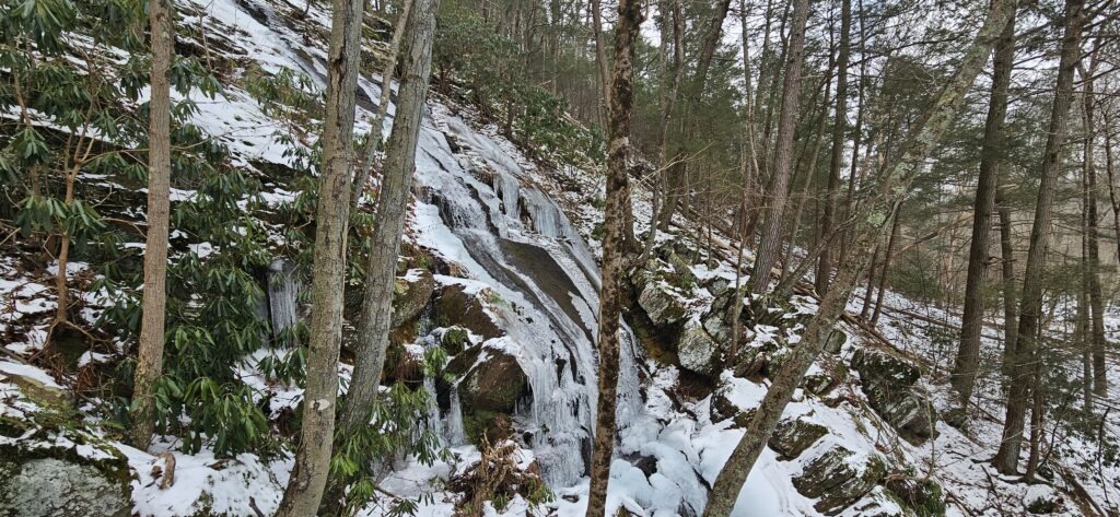 The middle of Buttermilk Falls in the winter