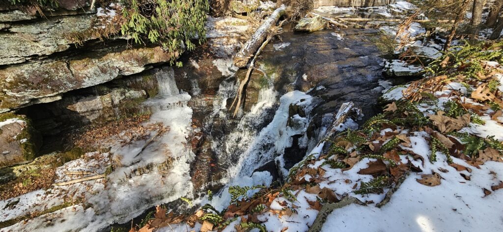 An image of a waterfall in winter