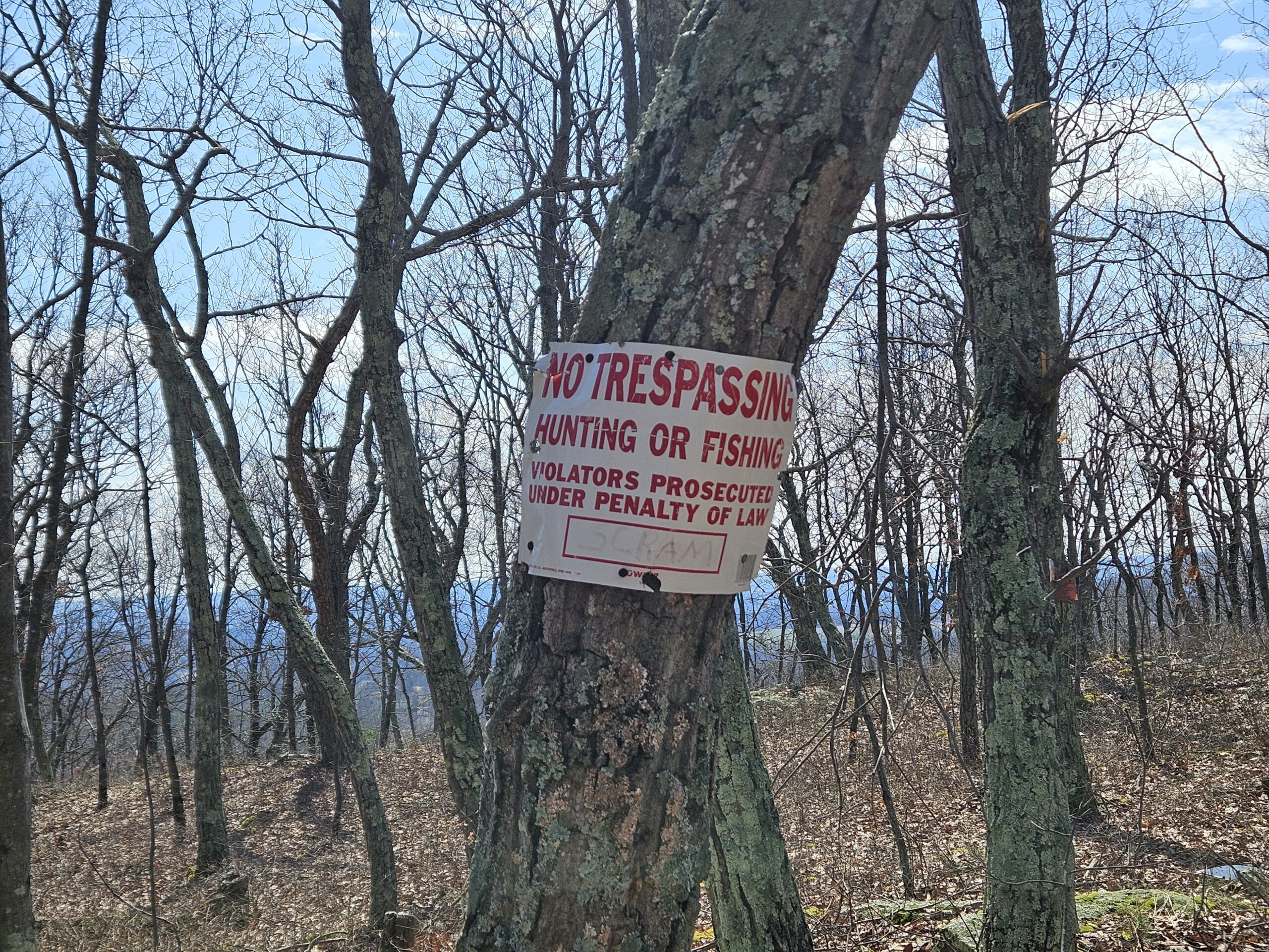 An image of a "No Trespassing" sign