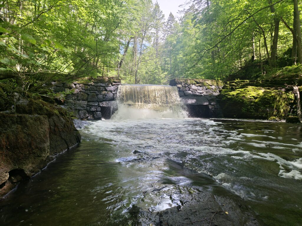 The dam waterfall at the Kay Center
