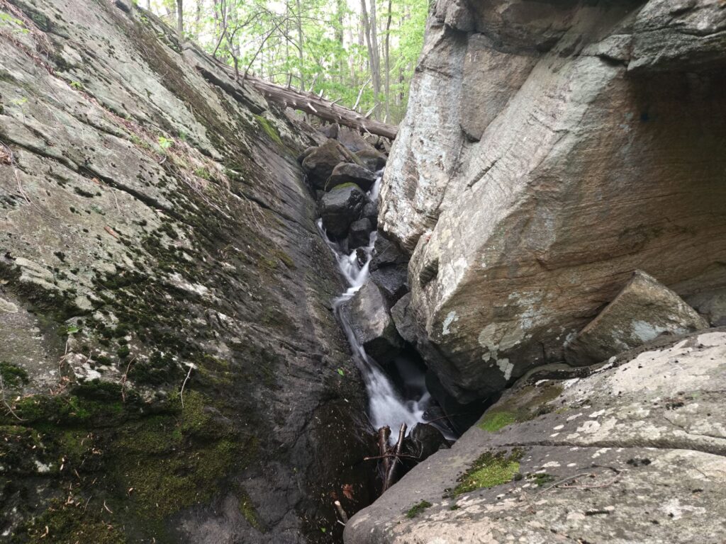 A long exposure image of a waterfall in Apshawa Preserve