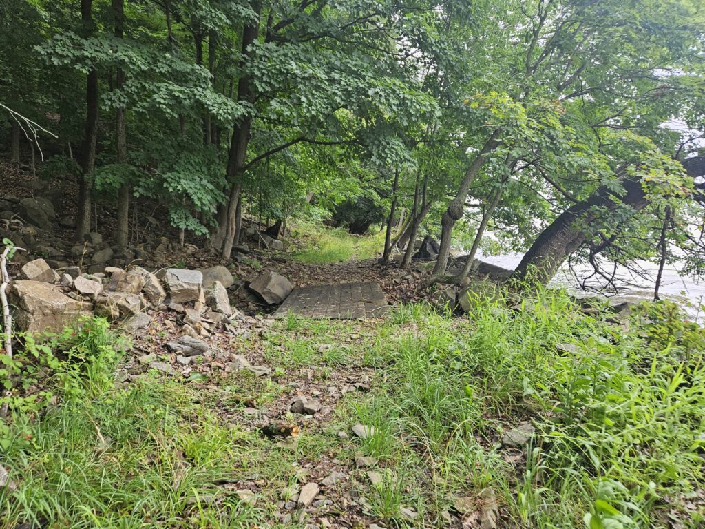 A small bridge at the base of Lost Brook Falls at Palisades Interstate Park
