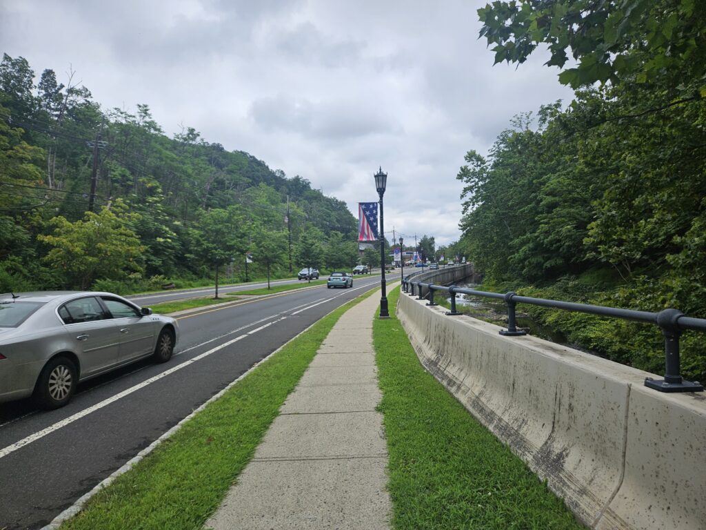 The sidewalk along Somerset Street near Wetumpka Falls