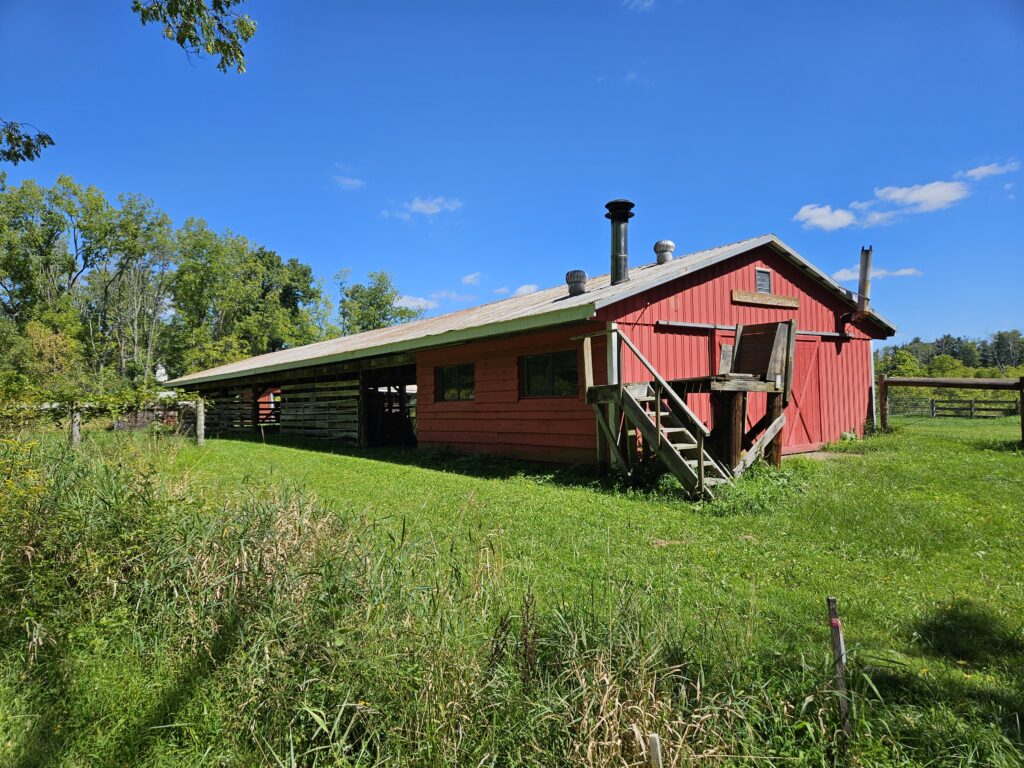 A barn housing maple sugar equipment at Lusscroft Farm