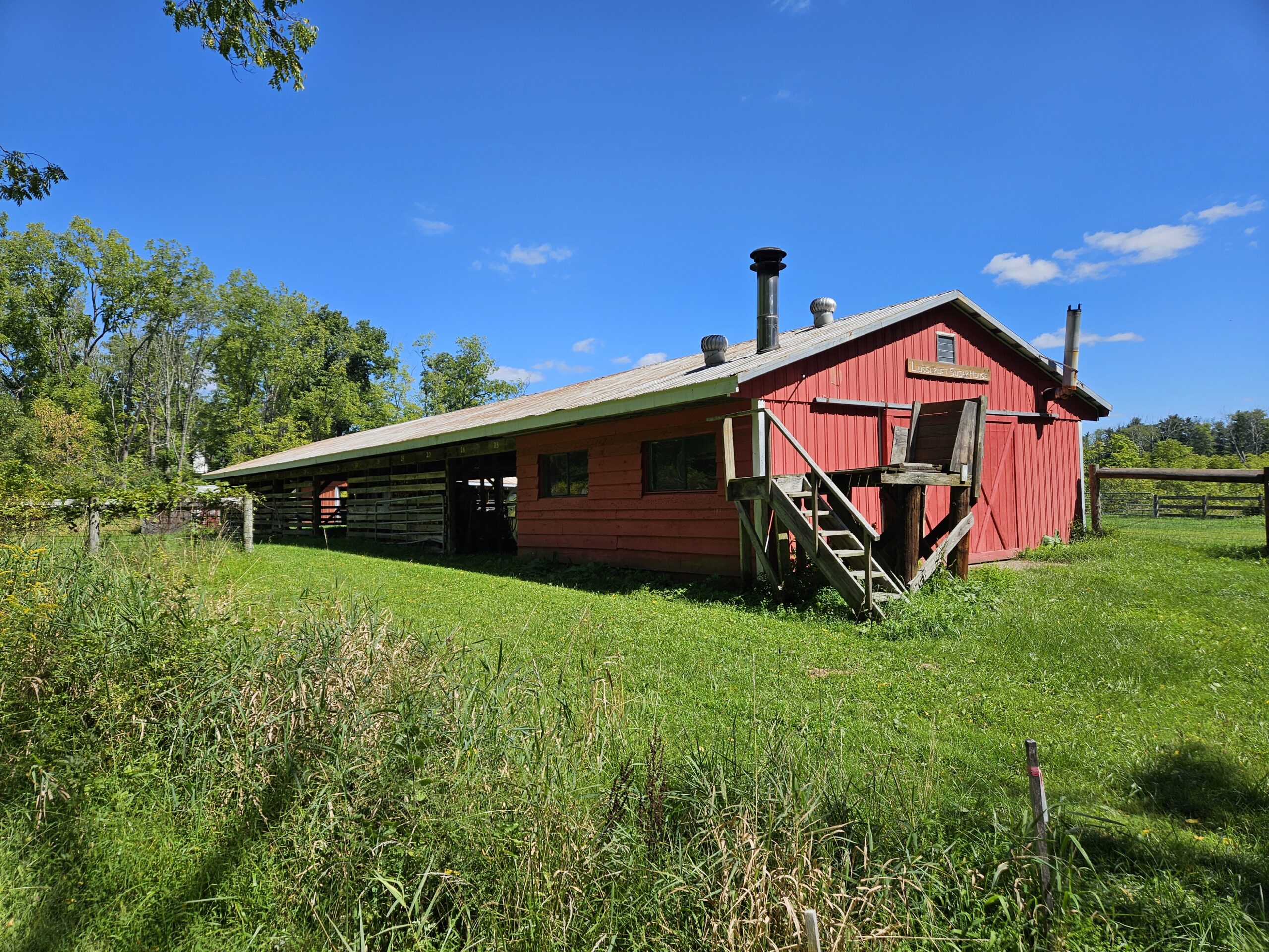 A barn housing maple sugar equipment at Lusscroft Farm