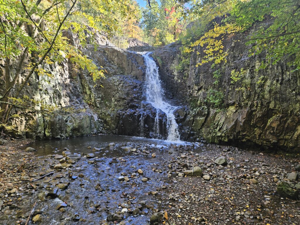 Hemlock Falls at South Mountain Reservation in the fall with changing leaves
