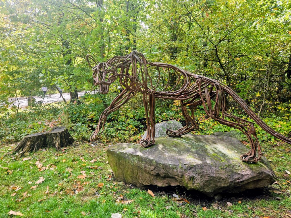 A sculpture of a large cat, titled "Catamount" at South Mountain Reservation